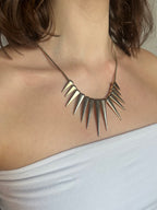 Collier piques métalliques
