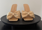 Mules dorées à talons